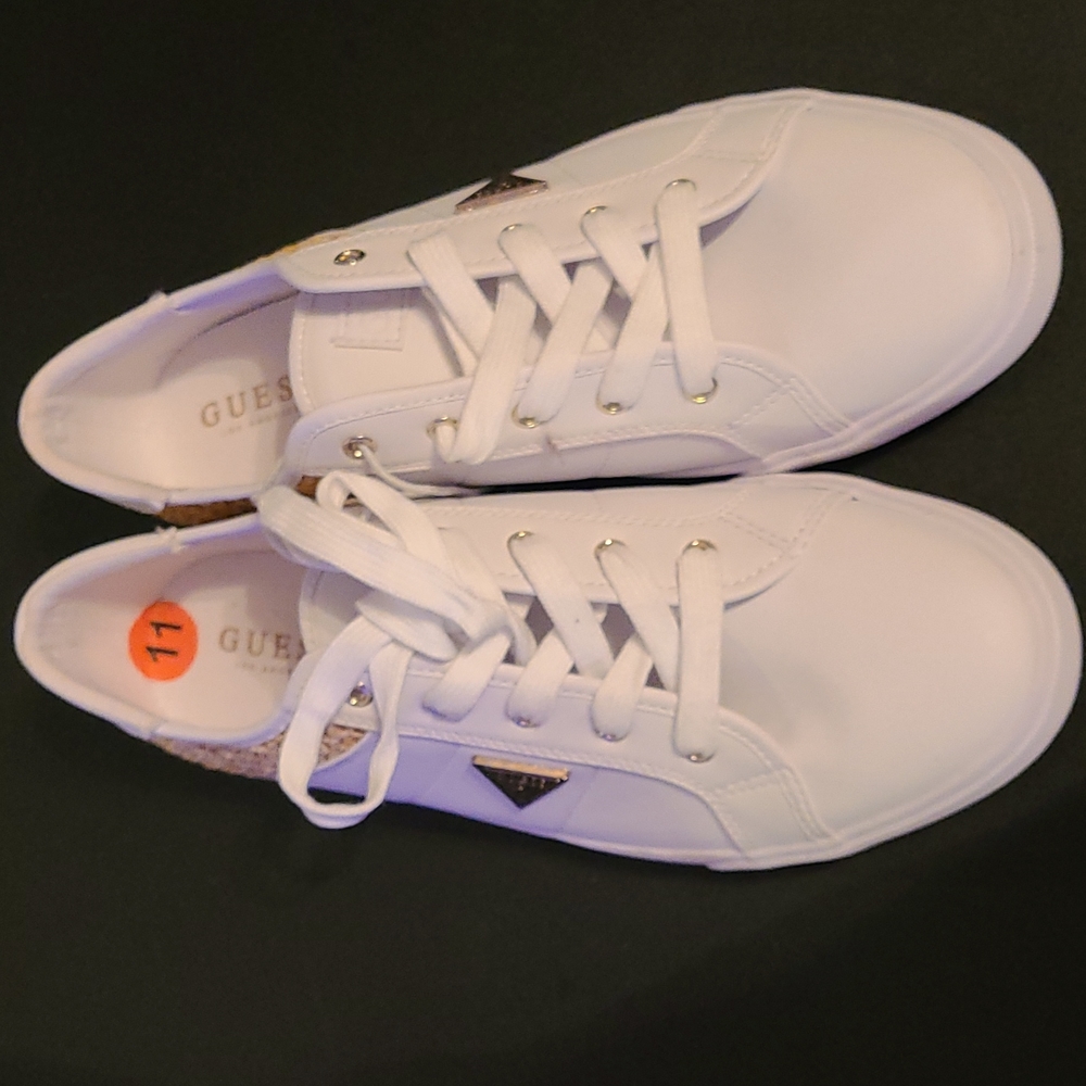 A pair of Guess women's sneakers(White) size 11 Brand New never worn